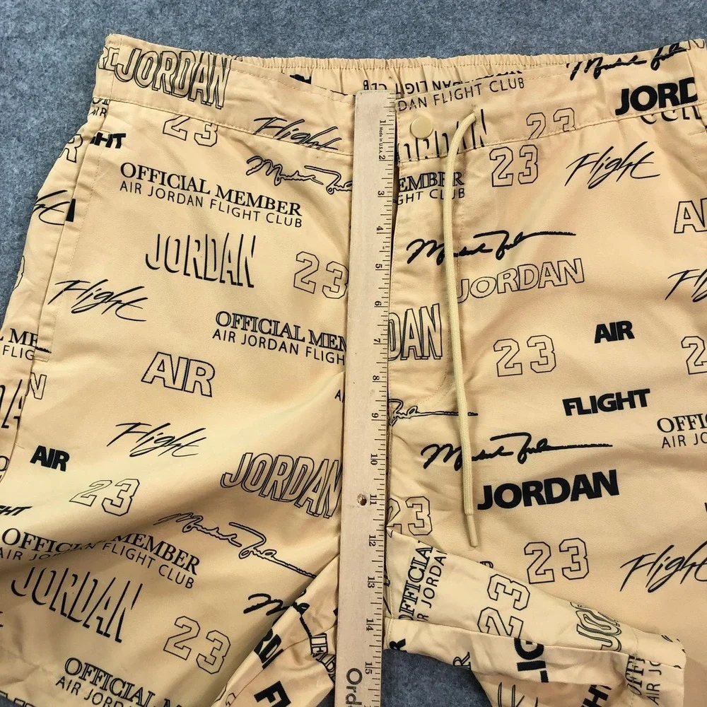 Jordan Mens Flight Club Shorts Medium Tan All-Over Print Graphic Drawstring